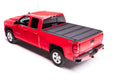 BAK Industries BAKFlip MX4 Folding Tonneau Cover for 2014-2019 GM Fullsize Trucks, 5 Feet 9 Inches Bed, Black Powder Coat Aluminum with Foam Support