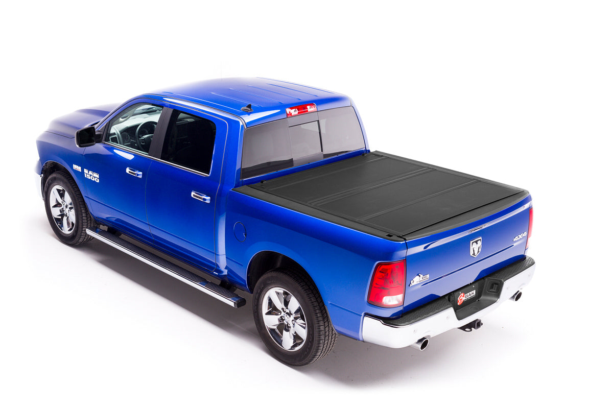 BAK Industries BAKFlip MX4 Tonneau Cover for Dodge Ram 6 ft 4 in Bed, Folding, Clamp-On Aluminum and Foam, Black Powder Coat